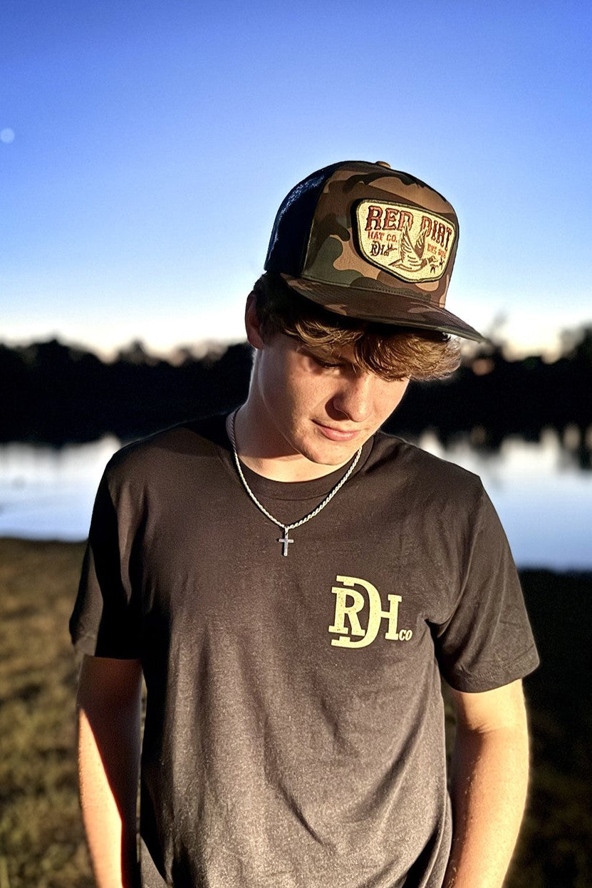 Red Dirt Hat Fly South Camo Hat with a flat bill mesh back snap patch hat with duck available at boltranchstore.com