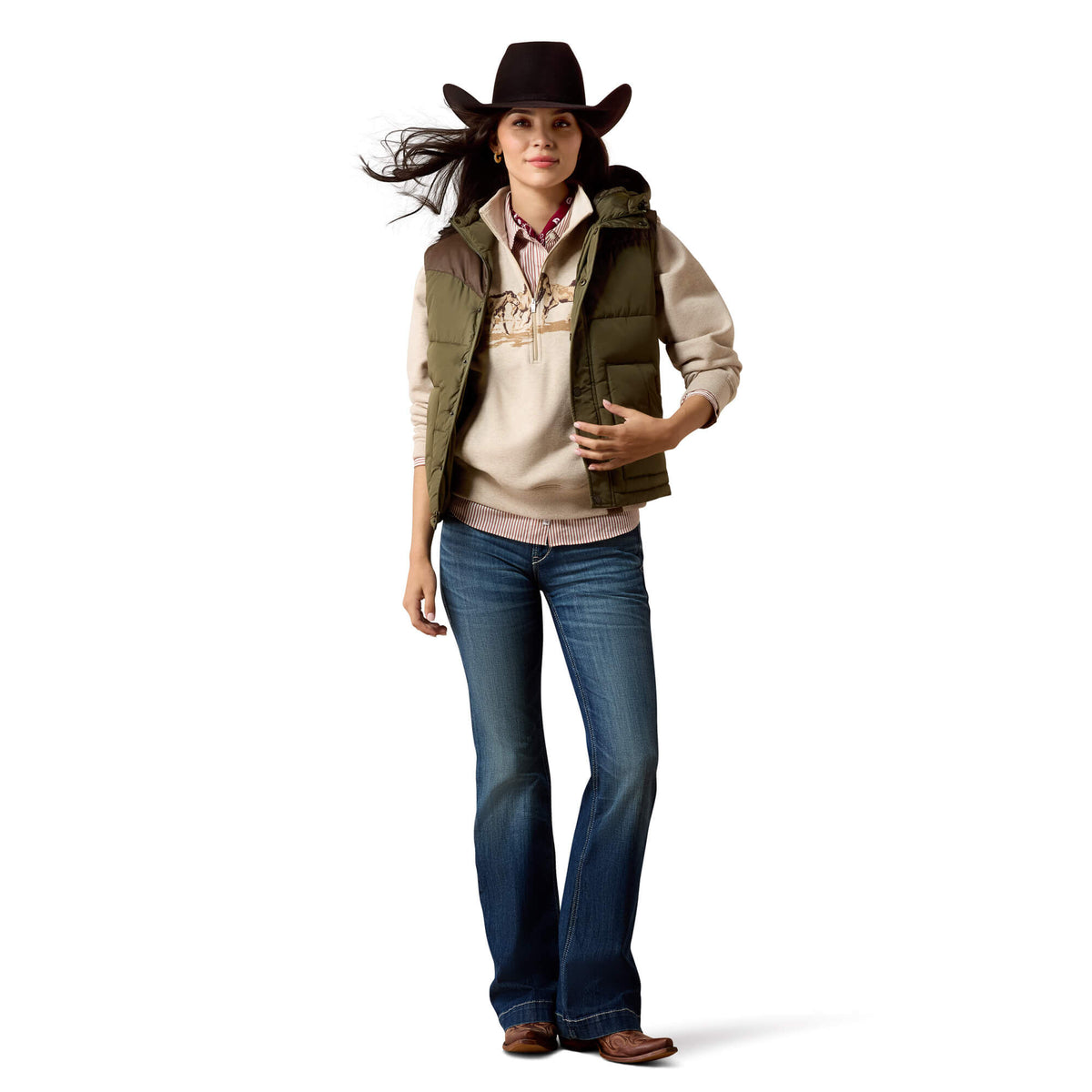 Ariat Frontier Puffer Vest Ivy Green Chicory Coffee styled with denim and a felt hat for rodeo and ranch wear