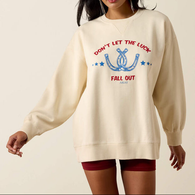 Ariat Womens Oversize Sweatshirt Parchment parchment cream heavyweight cotton fleece sweatshirt with red and blue horseshoe graphic womens western boutique Utah SKU 