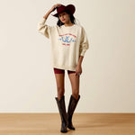 Ariat Womens Oversize Sweatshirt Parchment cozy layer styled with cowboy boots and a felt hat for fall rodeo days in Park City