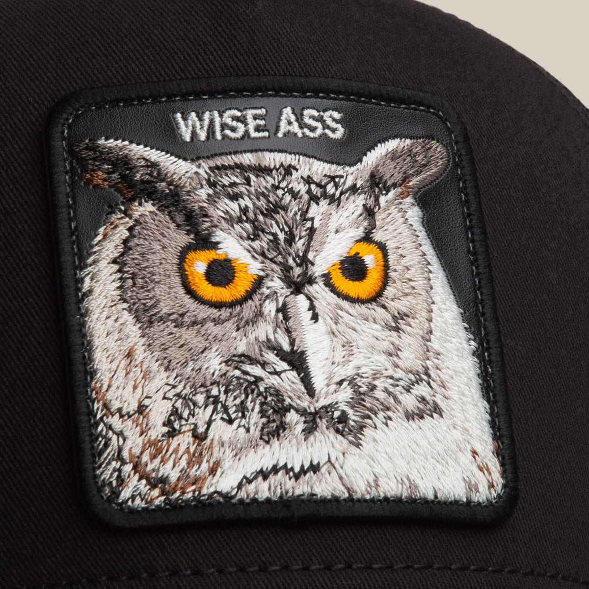 Goorin Bros Wise Ass Trucker embroidered patch framed clean on the crown with tonal stitching western fashion