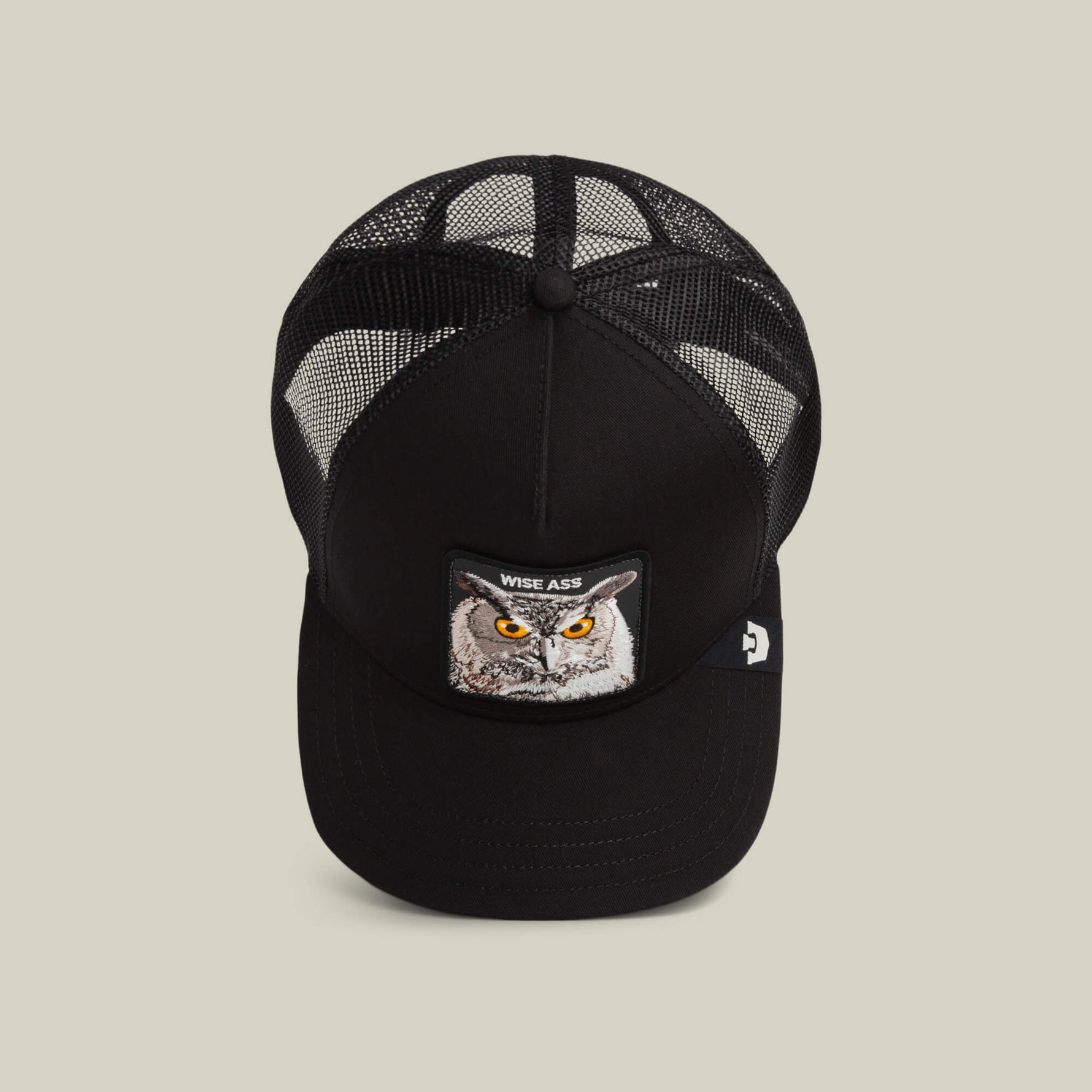 Goorin Bros Wise Ass Trucker six panel crown with a matching covered top button and clean seams rodeo ready