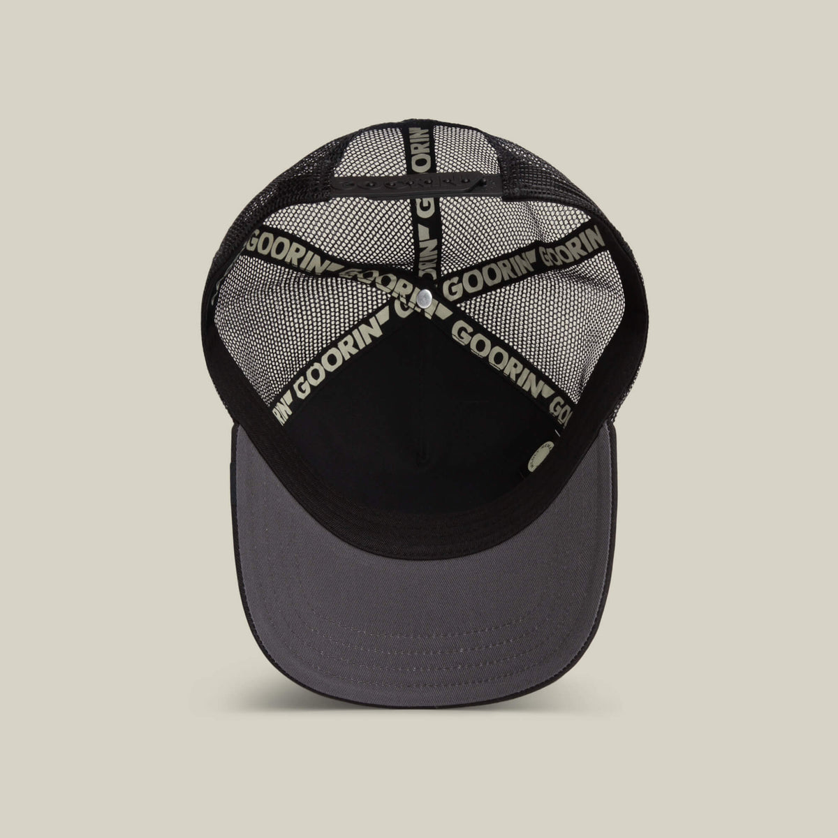 Goorin Bros Wise Ass Trucker gray underbrim beneath the brim for a quiet contrast Kamas Utah