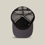Goorin Bros Wise Ass Trucker gray underbrim beneath the brim for a quiet contrast Kamas Utah