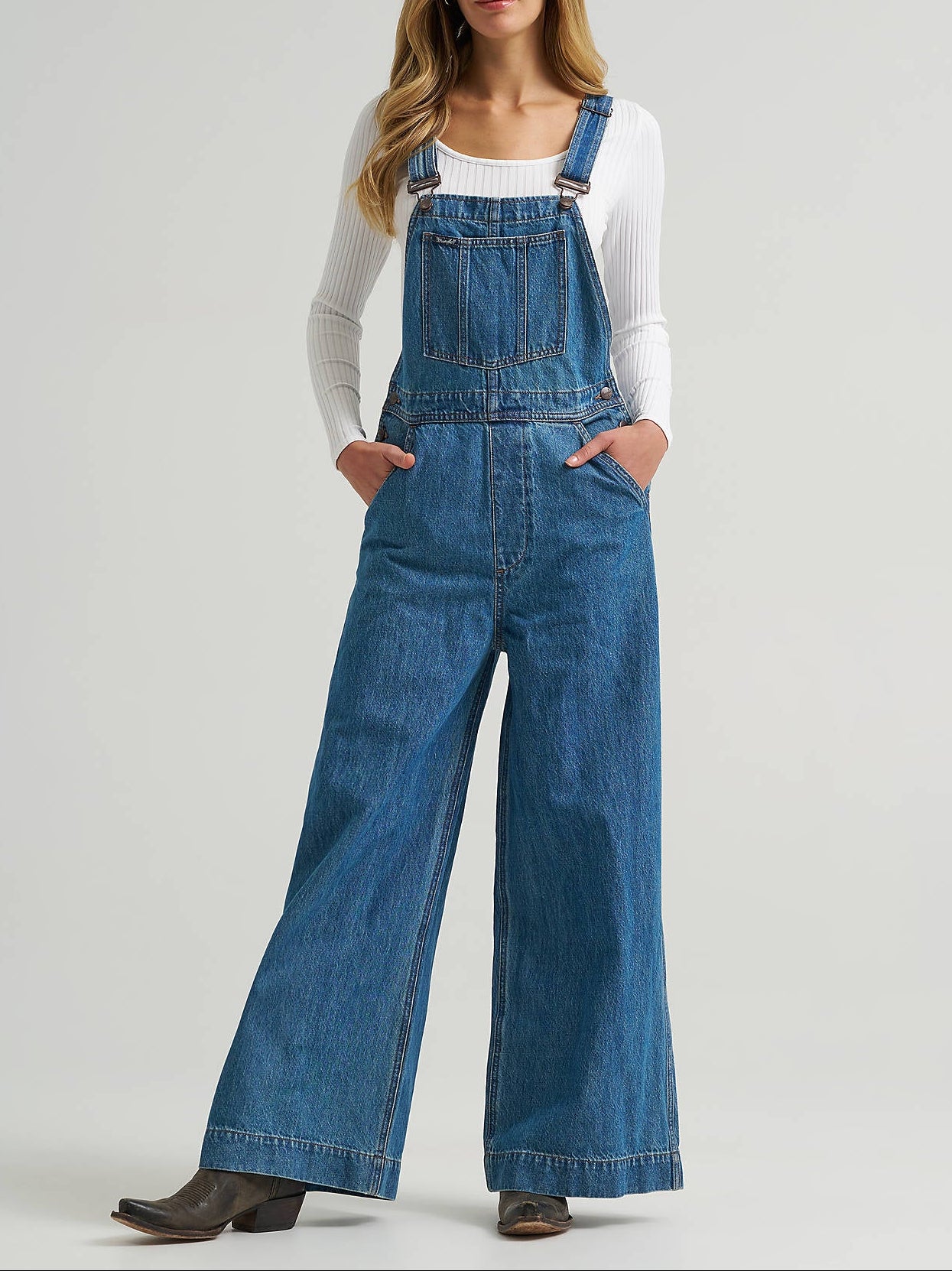 112382268 Wrangler Womens Retro Bailey Wide Leg Overalls at boltranchstore.com free shipping in stock Woman wearing blue denim overalls