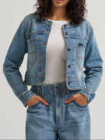 112384099 Lee Womens Cropped Chore Jacket at boltranchstore.com in stock free shipping A woman modeling a cropped light blue denim jacket 