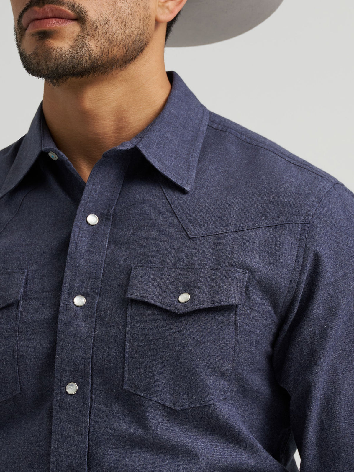 Wrangler Mens Cody Johnson Two Pocket Western Snap Shirt Solid Blue mitered snap cuffs with Cody Johnson signature logo embroidery rodeo