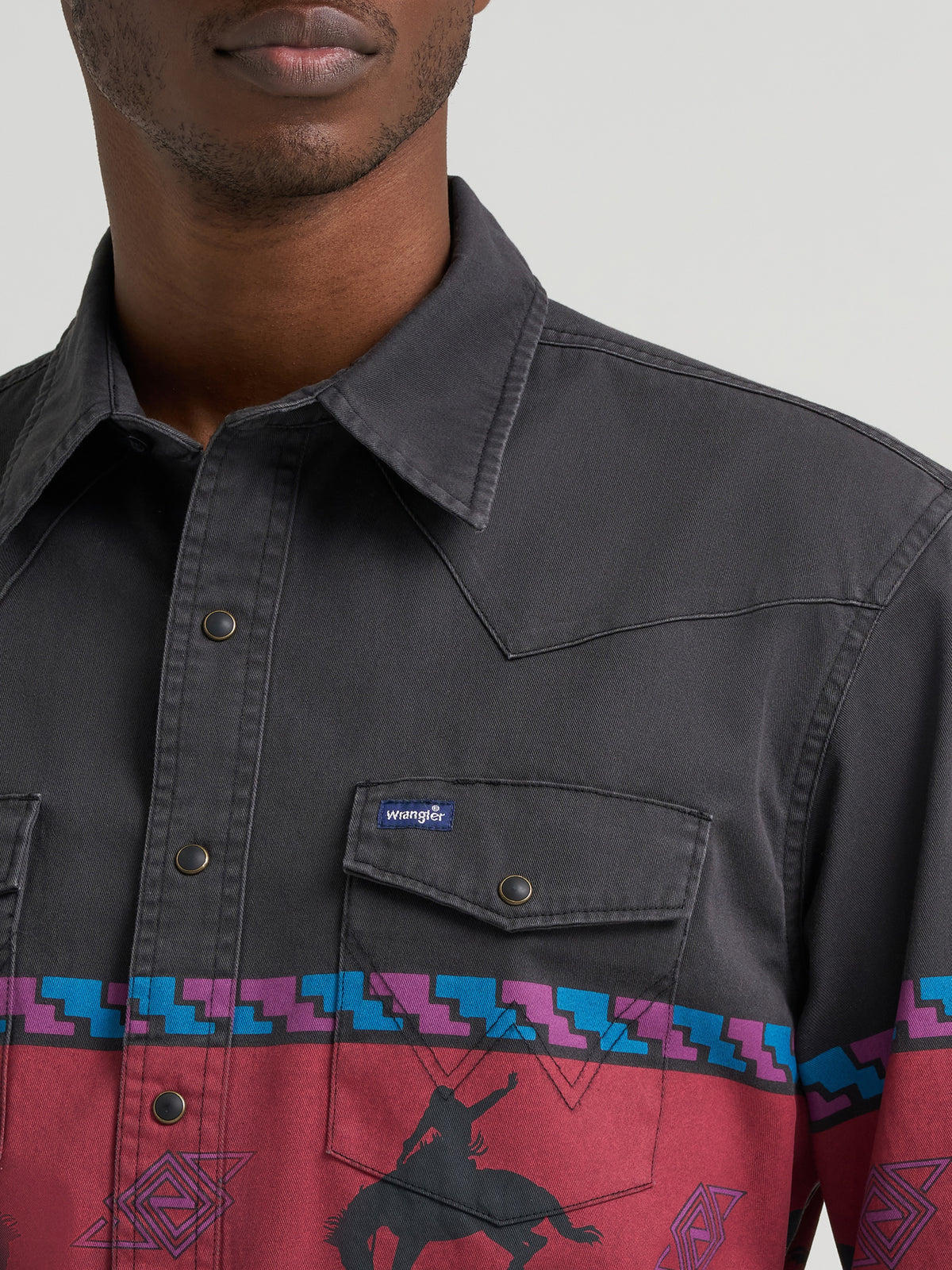 Wrangler Mens Vintage Inspired Horizon Stripe Western Snap Shirt Obsidian bronc rider and western motif border wrapping front to back for rodeo and everyday wear Park City