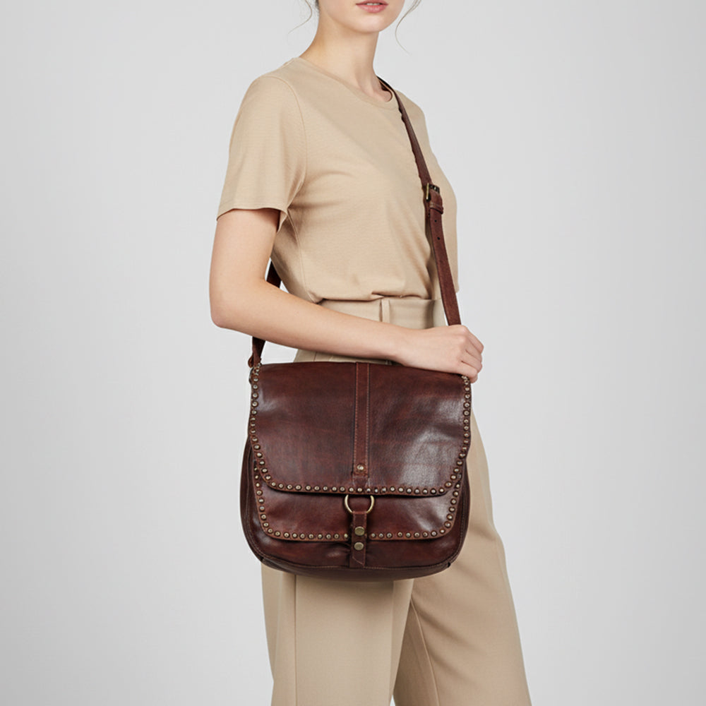 American Darling Vintage Inspired Studded Crossbody crossbody worn across the body for everyday western fashion