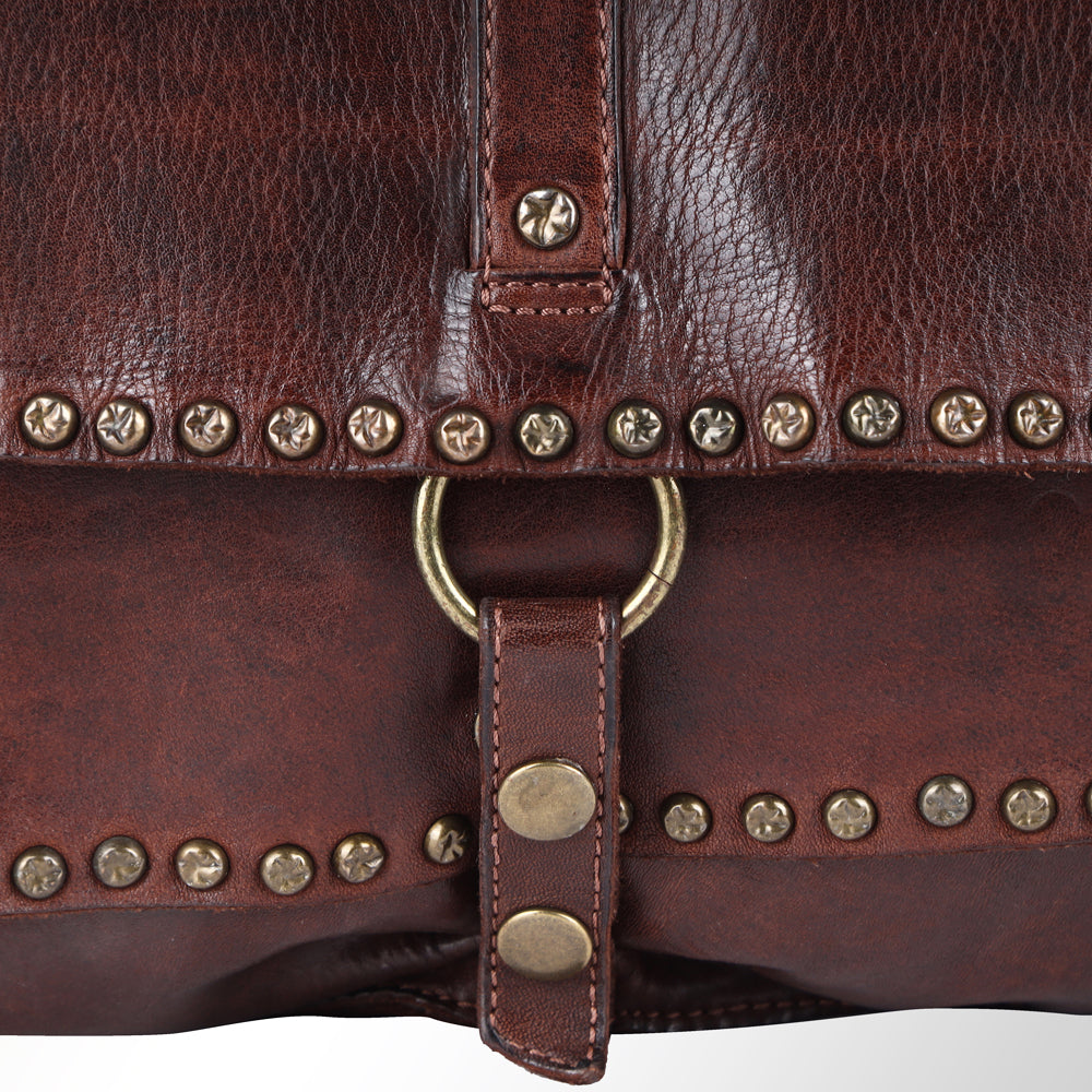American Darling Vintage Inspired Studded Crossbody close look at studs and the strap loop closure on the flap ranch wear