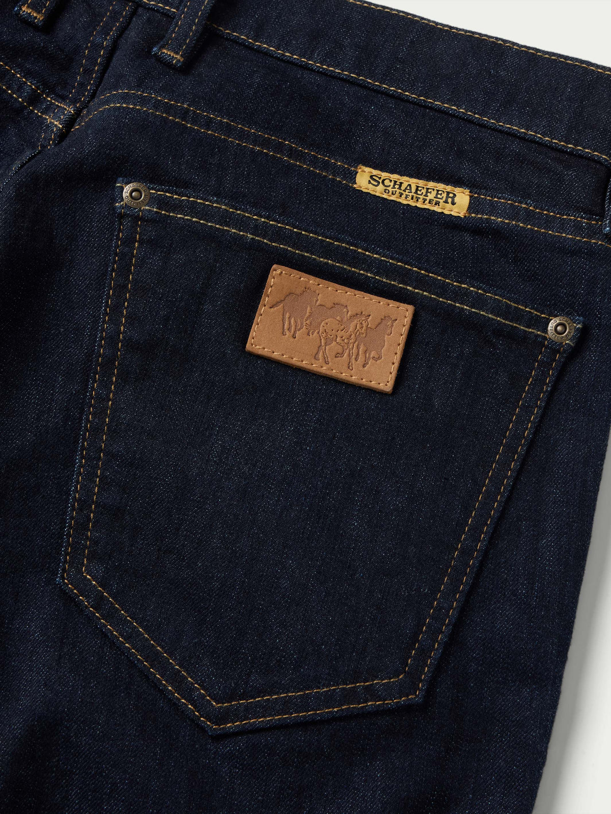 Schaefer Ranch Flex Boot Cut Dungarees Dark Rinse logo patch and brass tack button hardware ranch wear
