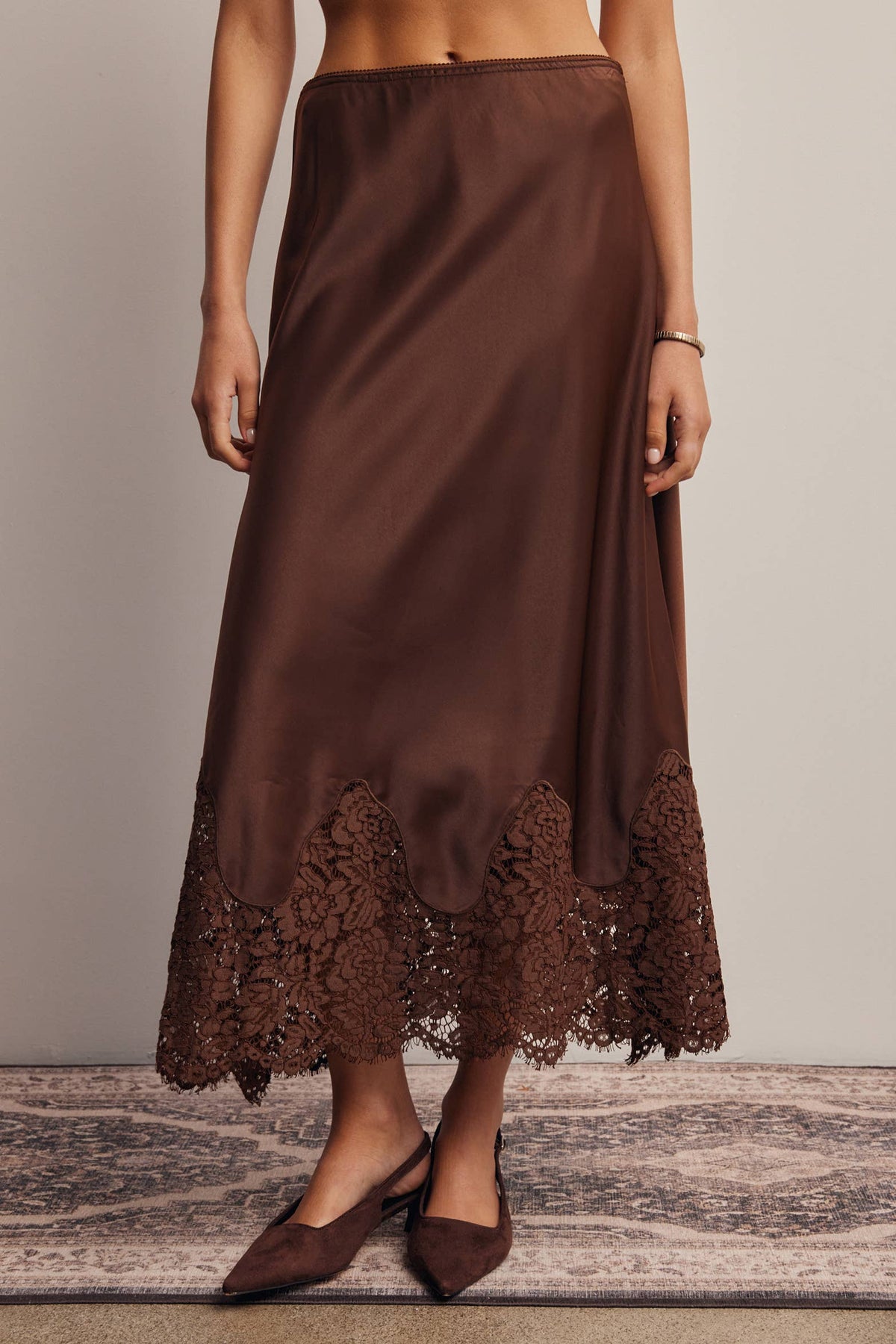 Listicle Stretch Satin Lace Trim Maxi Skirt Mocha sheer floral lace hem over a fully lined skirt Kamas