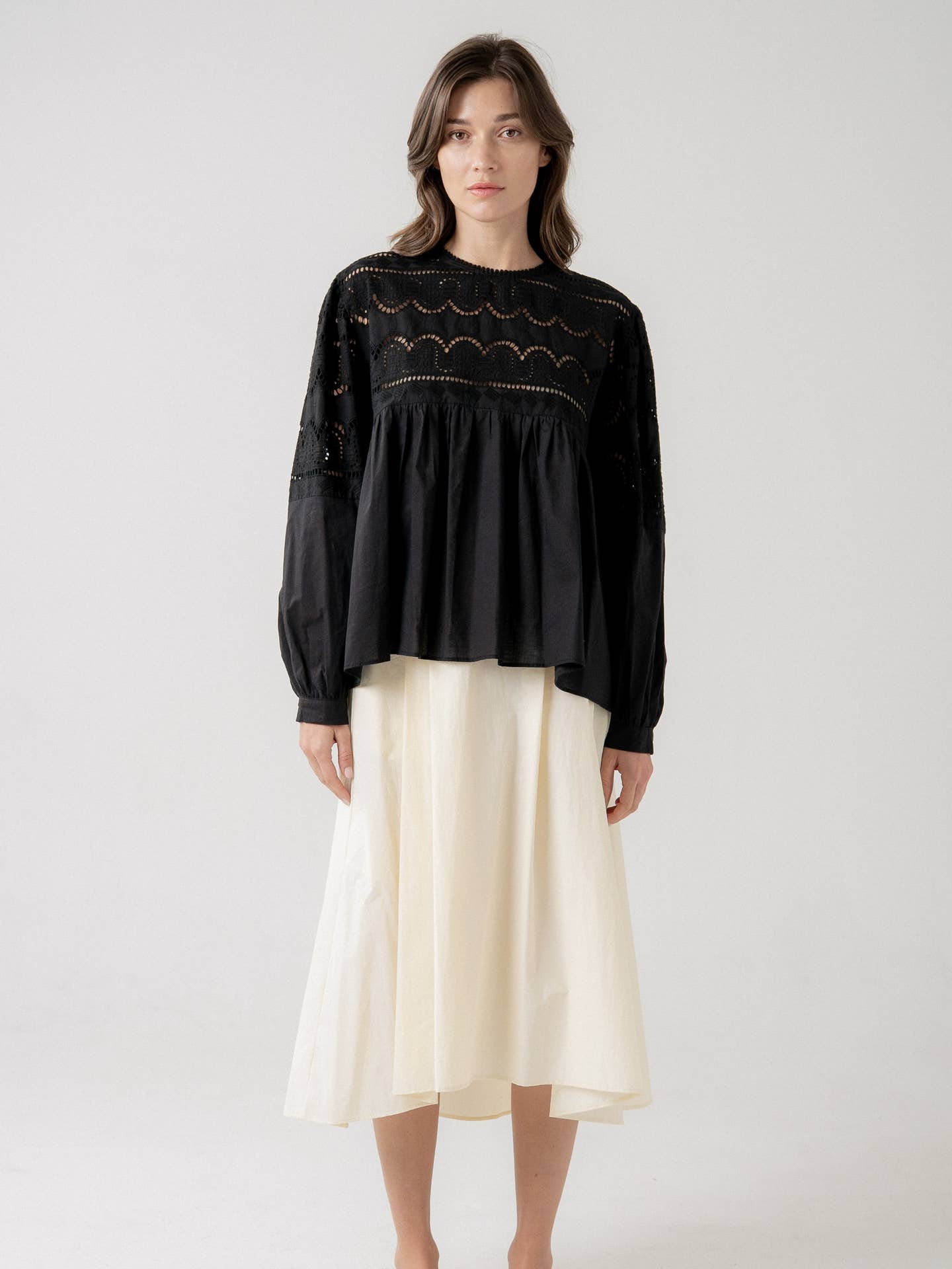 Cora Pleated Midi Skirt with Asymmetrical Hem