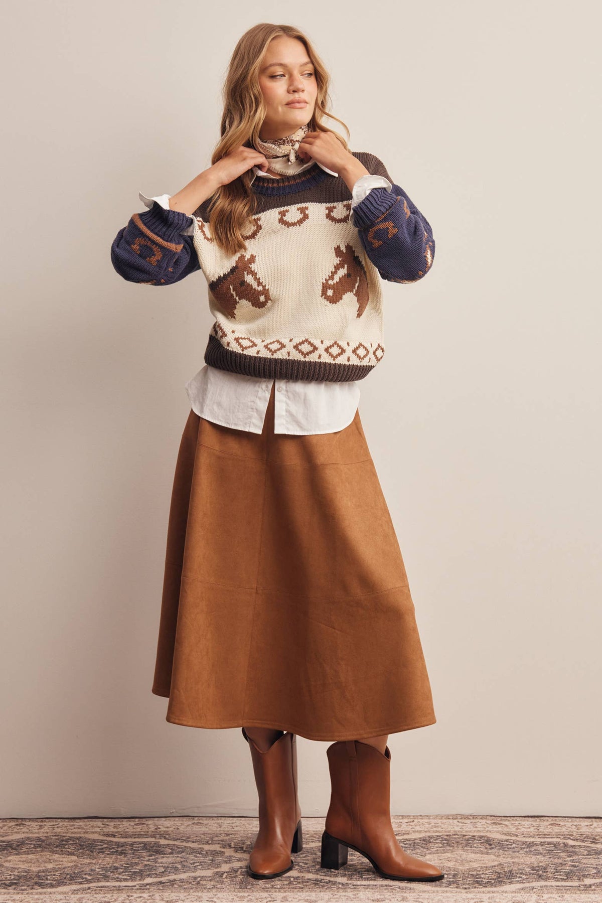 Listicle Stretched Suede A Line Midi Skirt paired with a tucked knit sweater for fall ranch wear Kamas
