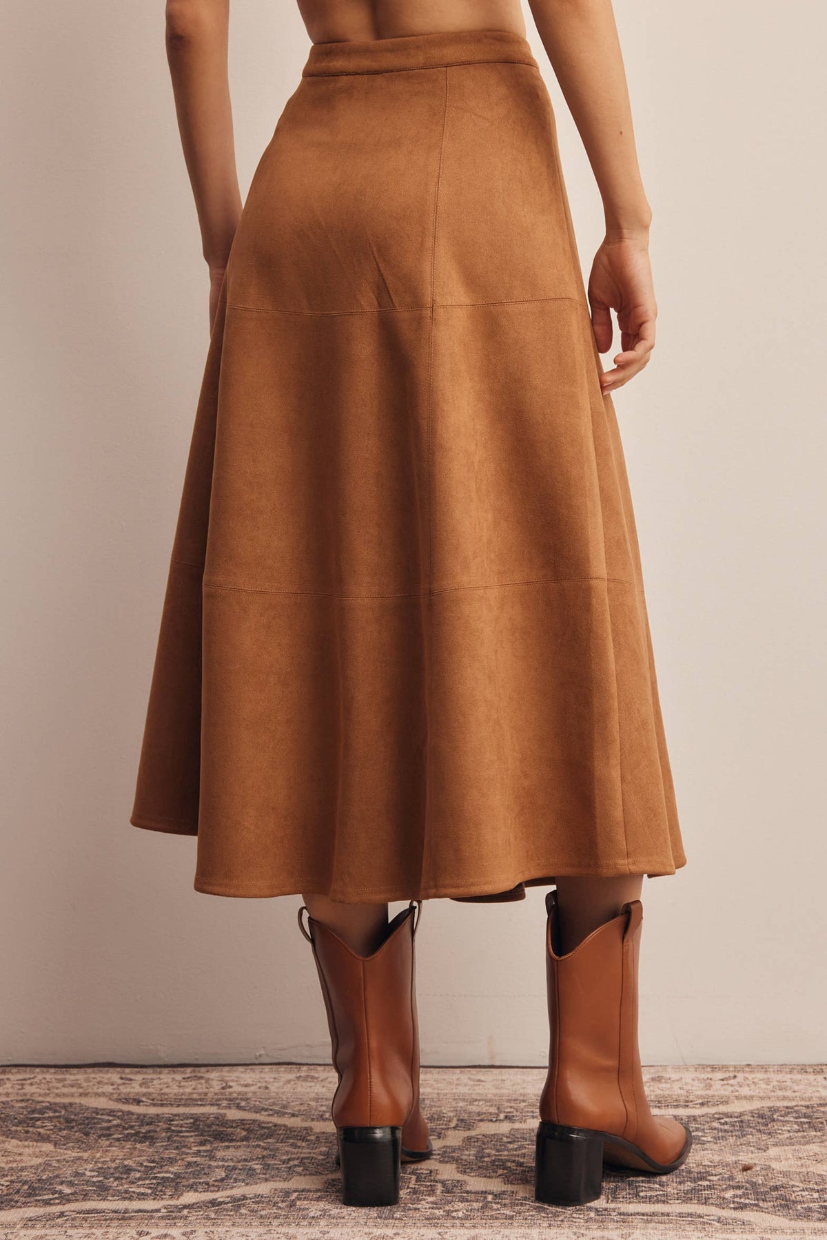 Listicle Stretched Suede A Line Midi Skirt midi length hem styled with western boots cowgirl Park City