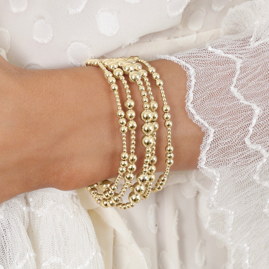 enewton Joy Gold 4mm Bracelet layered in an all gold bracelet stack for everyday western fashion