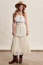 Listicle Lace Tiered Maxi Skirt romantic boho maxi styled with western boots and a cowboy hat ranch wear Kamas