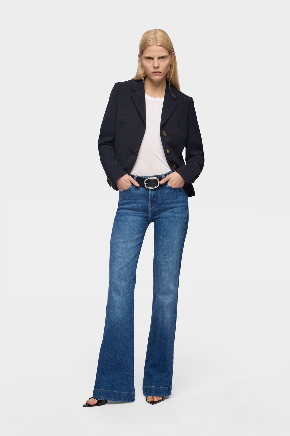 7 For All Mankind DOJO in Slim Illusion Moonwater mid rise fit fitted through the hips and thighs with a long lean silhouette womens western clothing