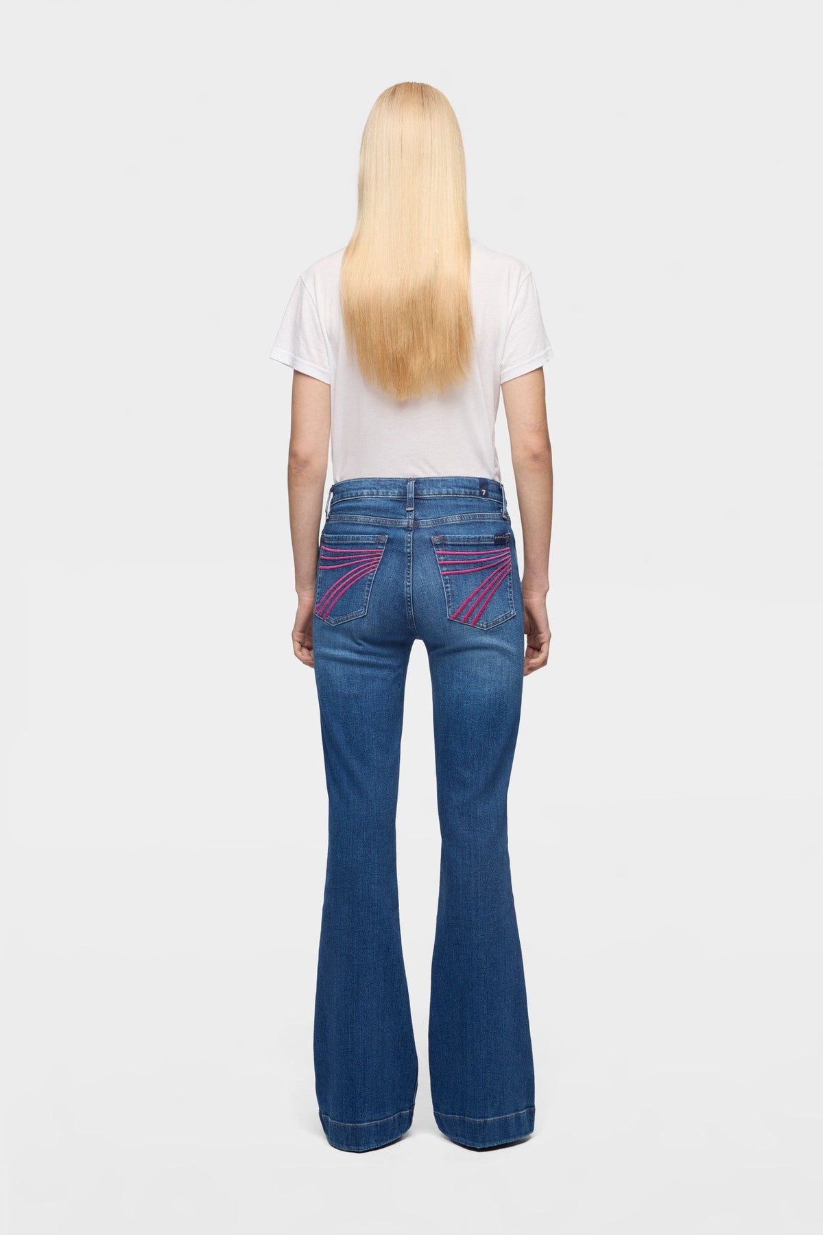 7 For All Mankind DOJO in Slim Illusion Moonwater zip fly with button closure at the waist for a clean mid rise finish Kamas