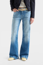 7 For All Mankind Tailorless Dojo in Comfort Blue Haze signature 7 back pocket stitching in rainbow thread womens western clothing