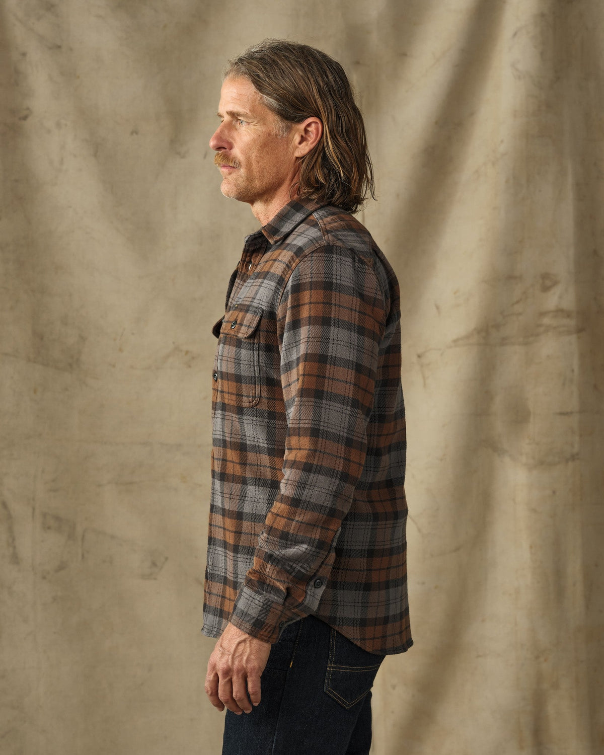 Filson Vintage Flannel Work Shirt Brown Charcoal Plaid relaxed work shirt cut with dual shoulder pleats on the back yoke for free range of motion ranch wear