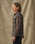 Filson Vintage Flannel Work Shirt Brown Charcoal Plaid relaxed work shirt cut with dual shoulder pleats on the back yoke for free range of motion ranch wear