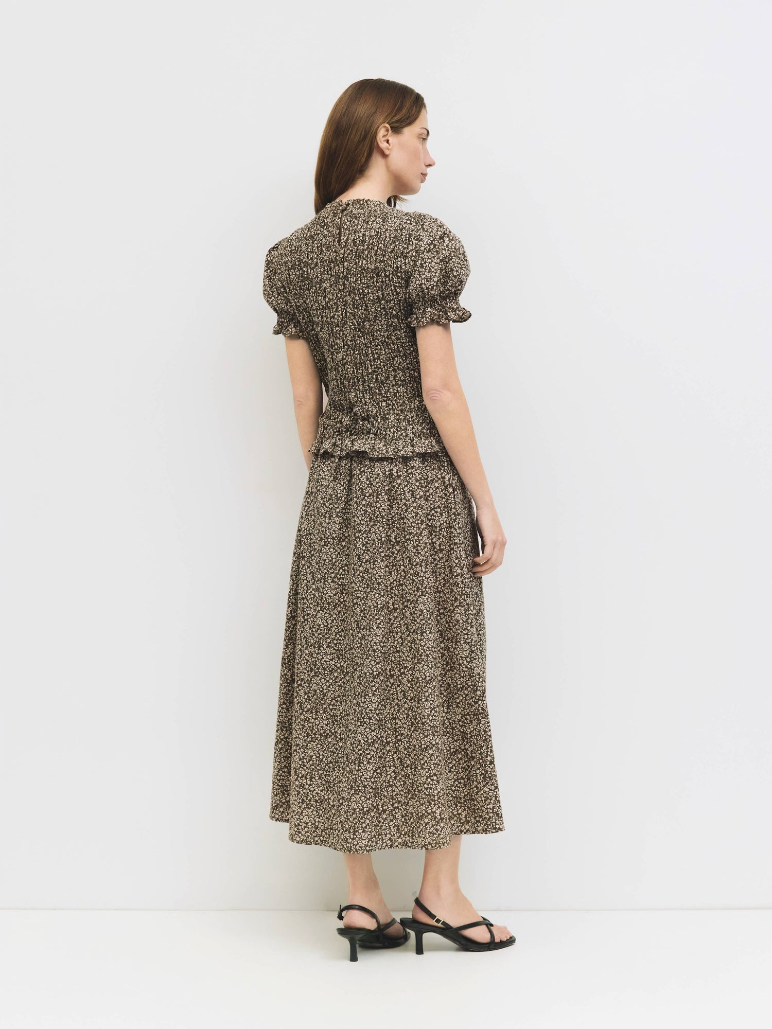 The Harleen Smocked Floral Puff Top