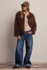Listicle Shaggy Faux Fur Jacket statement layering piece with side seam pockets for holiday parties and nights out rodeo Utah