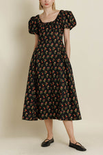 Mia Dress The Mia Floral Dress features a black base adorned with vibrant red flowers, crafted from non-stretch cotton poplin for a crisp feel womens at Boltranchstore.com