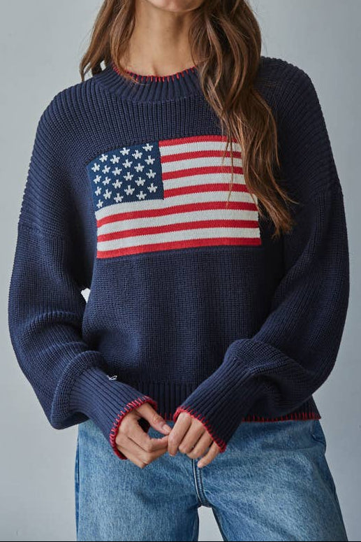 Ana American Flag Knit Sweater Pullover womens blue with an american flag and red whip stitch on collar and sleeve brandy melville dupe sold near me at western boutique Bolt Ranch Store near Park City Utah