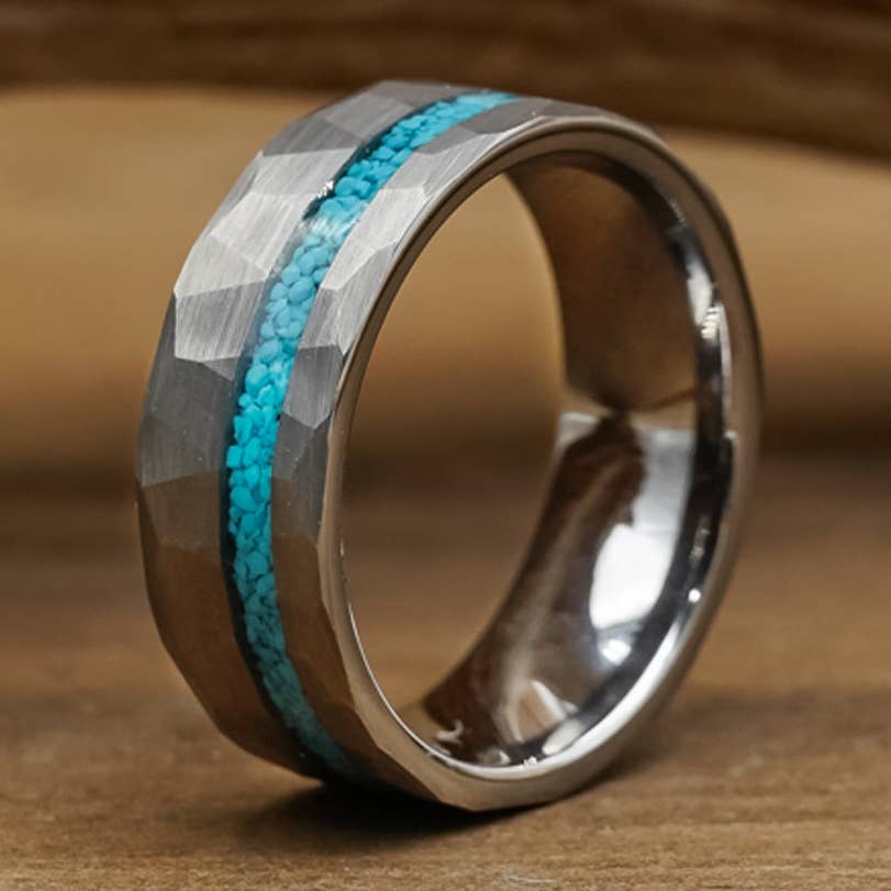 A silver-toned ring with a faceted geometric exterior and a bright turquoise blue inlay running down the center Antler Ring The Rocky Mountain at bolt ranch store in stock mens ring mens antler ring all different colors 