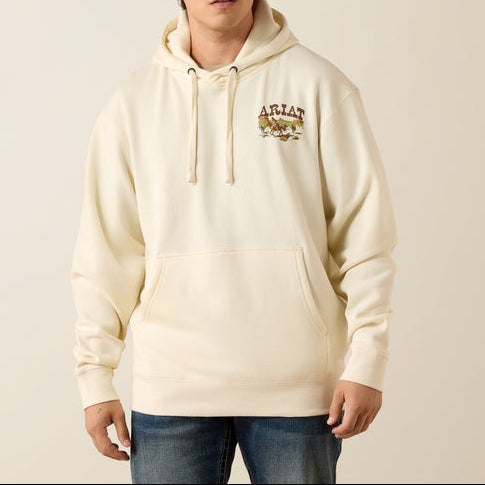 Ariat Mens Pulp Western Hoodie at boltranchstore.com in stock free shipping A man wearing a cream-colored pullover hoodie with a brown and gold graphic on the left chest
