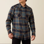 Ariat Retro Harbert Fitted Snap Shirt at boltranchstore.com in stock free shipping mens western button down shirt mens fall western shirt A man wearing a long-sleeve plaid button-up shirt in navy blue, teal, and tan