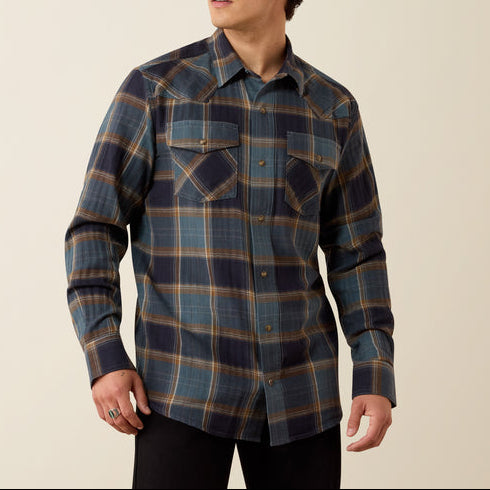 Ariat Retro Harbert Fitted Snap Shirt at boltranchstore.com in stock free shipping mens western button down shirt mens fall western shirt A man wearing a long-sleeve plaid button-up shirt in navy blue, teal, and tan