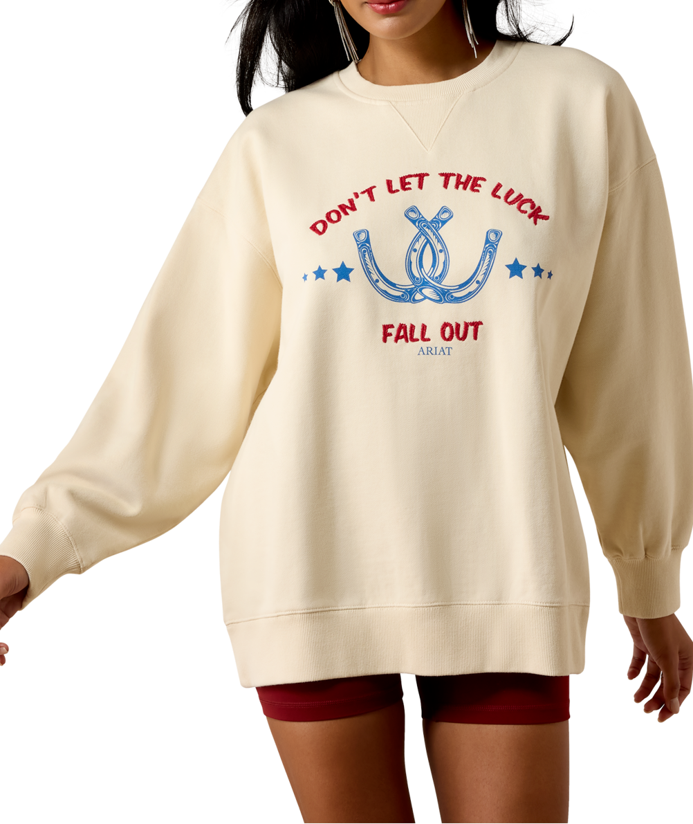 Ariat Womens Oversize Sweatshirt Parchment parchment cream heavyweight cotton fleece sweatshirt with red and blue horseshoe graphic womens western boutique Utah SKU 10080509
