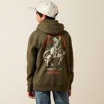Ariat Youth International Rodeo Hoodie at boltranchstore.com in stock free shipping A boy wearing an olive green hoodie with a large white and red graphic print on the back.