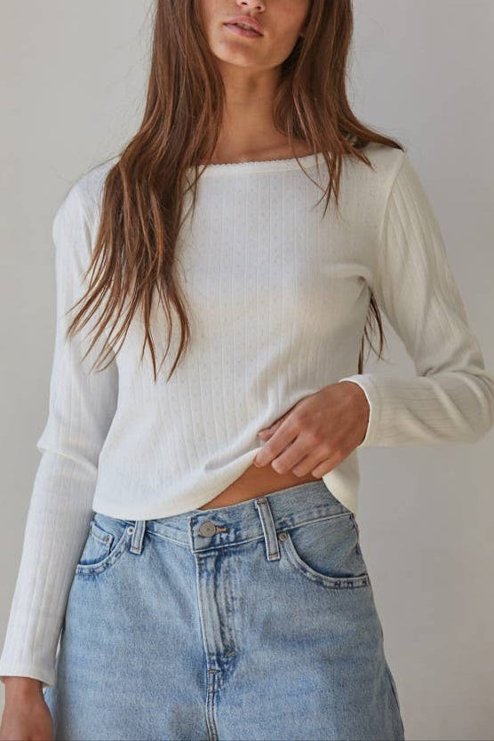 Elevate your wardrobe with the Audrey Pointelle Top, crafted from a comfortable blend of polyester, rayon, and spandex. This long-sleeve womens top at Boltranchstore.com