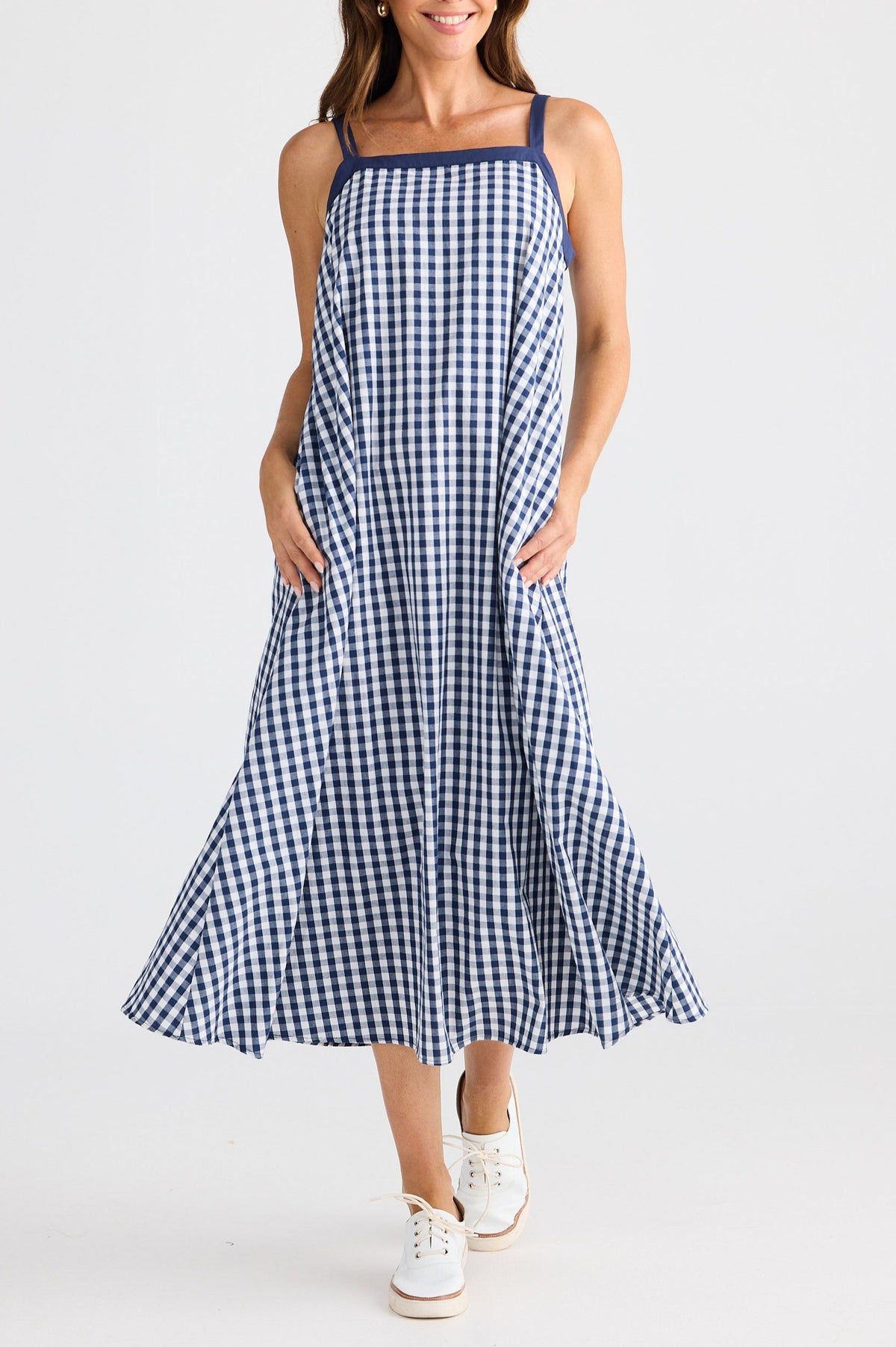 navy and white gingham dress with navy trim and tank top straps pockets bow in back Brave and True Label Bolt Ranch Store boltranchstore.com summer dress flow