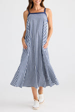 navy and white gingham dress with navy trim and tank top straps pockets bow in back Brave and True Label Bolt Ranch Store boltranchstore.com summer dress flow