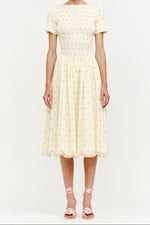 Bianca Smocked Midi Dress a ditsy butter yellow floral dress with a drop waist smocked midi dress at boltranchstore.com