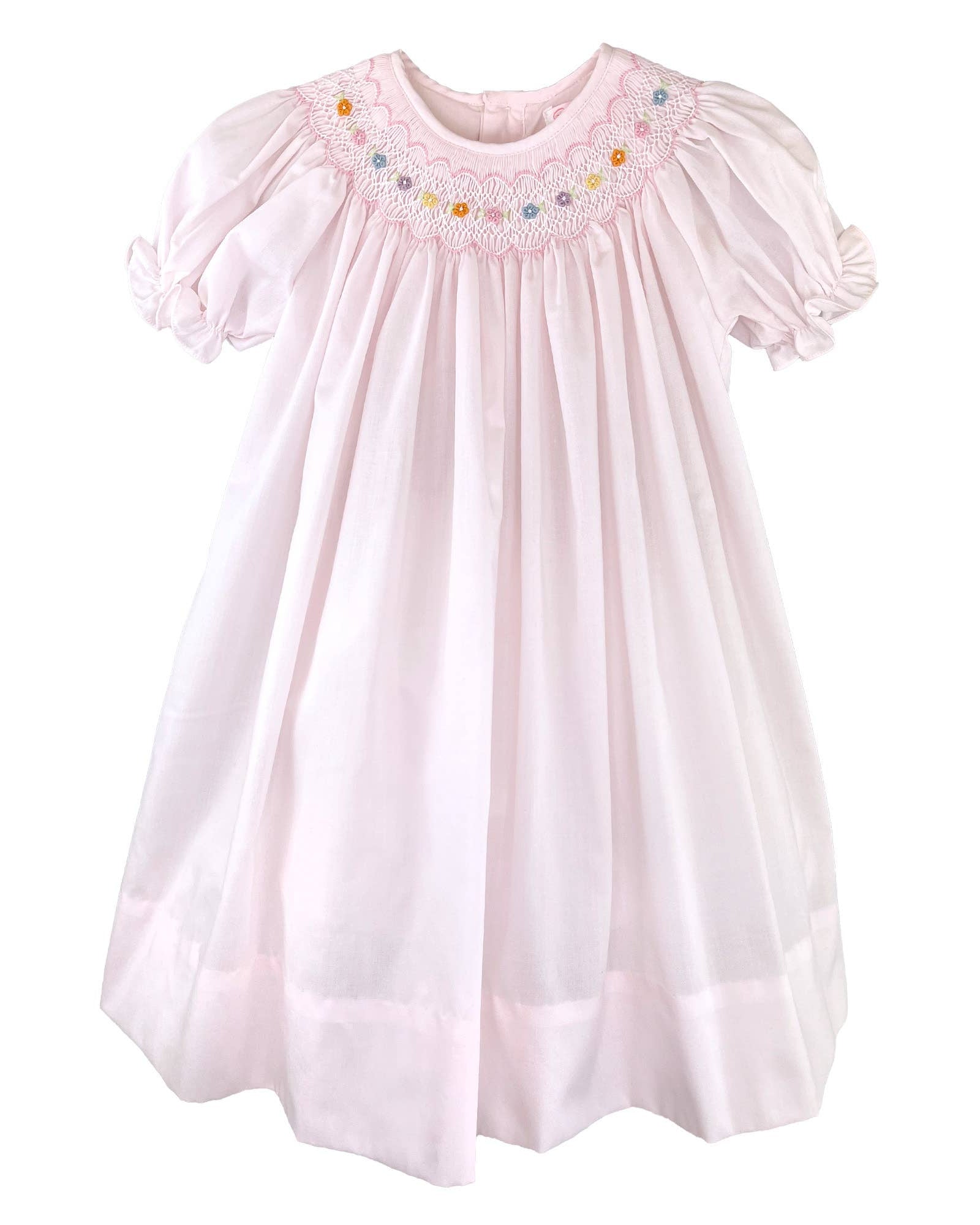 Bishop Smocked Dress with Flowers with short sleeves and colorful flowers around the neckline at boltranchstore.com