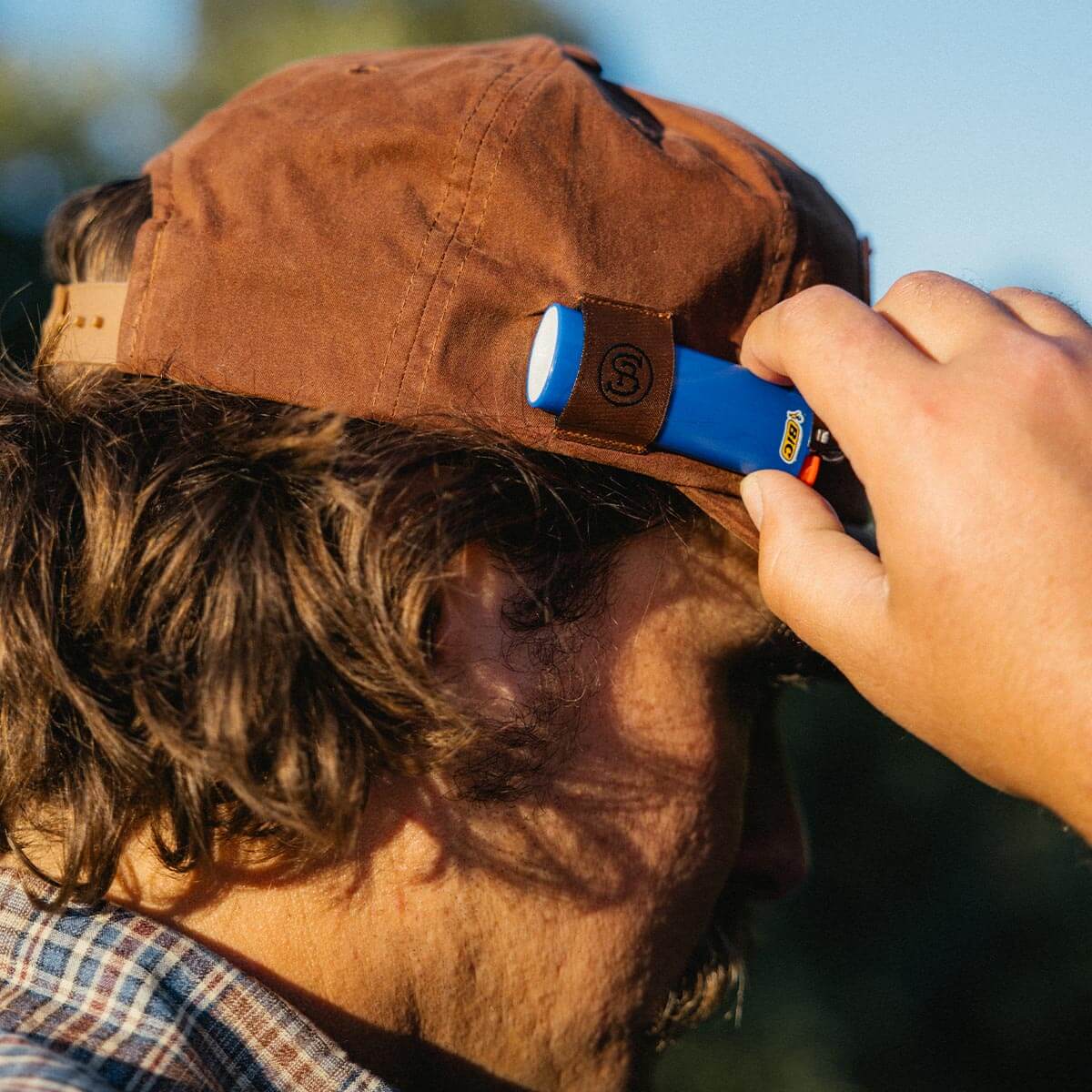 Seager Bison Waxed Snapback Brown waxed cap worn on the job site cowboy