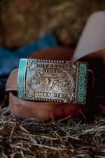 Bolt Ranch Turquoise Fenced Buckle with turquoise sides and scroll swirl design will bullhead bolt ranch store logo. limited edition buckle available now.