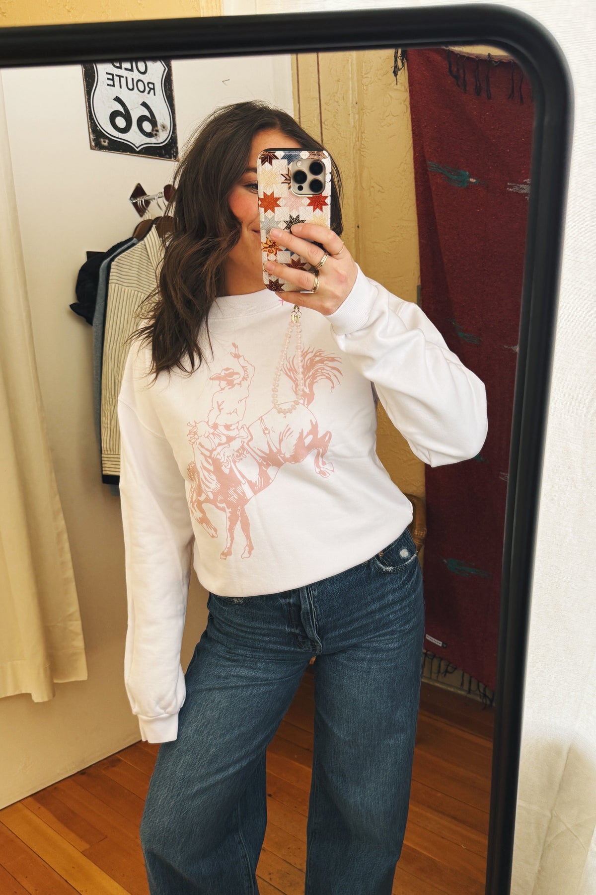 Bucking Cowboy Long Sleeve Crewneck
womens cream and pink long sleeve top cowgirl rodeo western fashion Boltranchstore.com