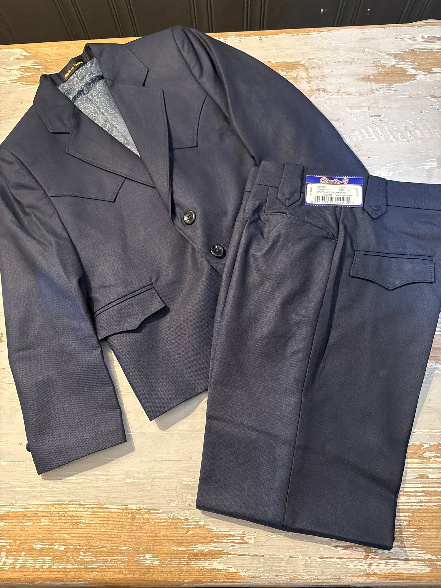 Circle S Youth Plano Suit a full suite in navy two font buttons untailored unhemmed pants available at boltranchstore.com