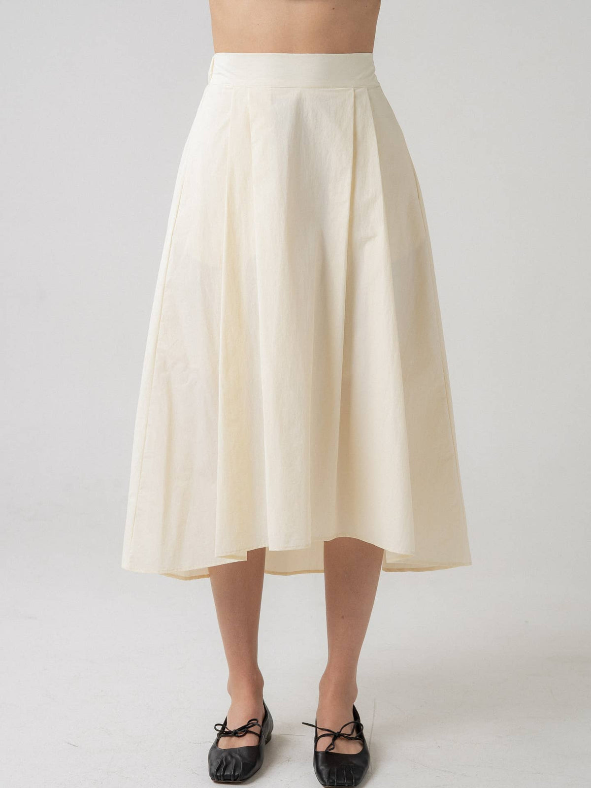 Cora Pleated Midi Skirt with Asymmetrical Hem shop at boltranchstore.com 