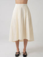 Cora Pleated Midi Skirt with Asymmetrical Hem shop at boltranchstore.com 