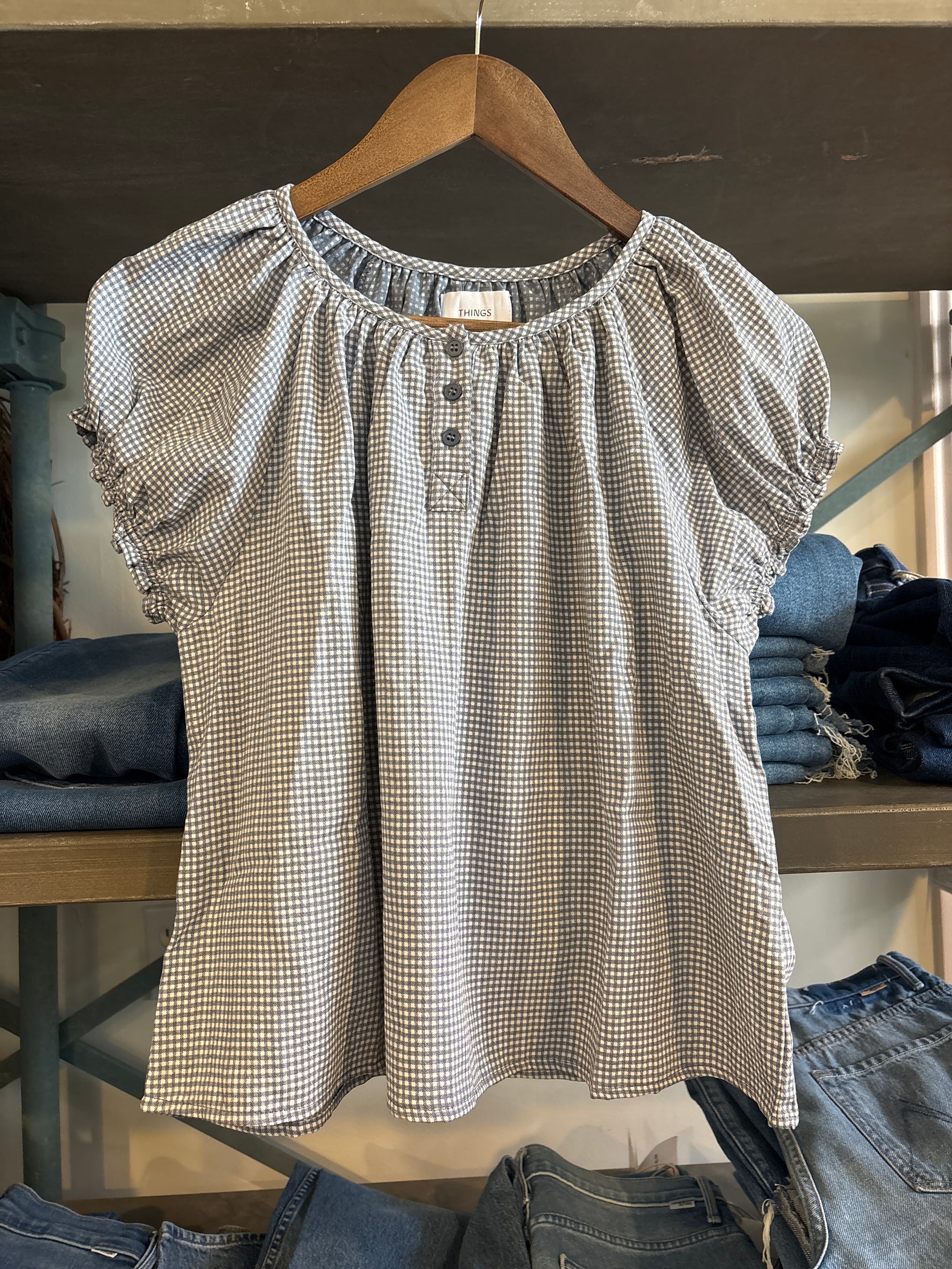 Cora Blue Gingham Top blue and white small gingham button down round neck womens top cap sleeve ruffle detail. western fashion style Boltranchstore.com Free Shipping 