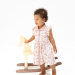 Cowgirl Boots and Bows Western Pearl Snap Dress & Bloomer at boltranchstore.com in stock free shipping A toddler girl wearing a light pink sleeveless dress with a white and pink patterned