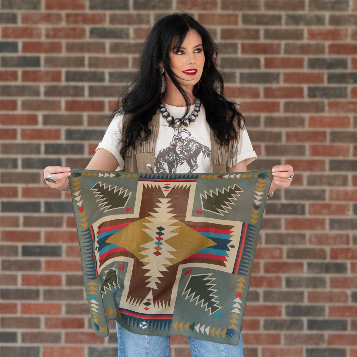 Fringe Cross Me Bandana Sage pairs with a denim jacket Park City